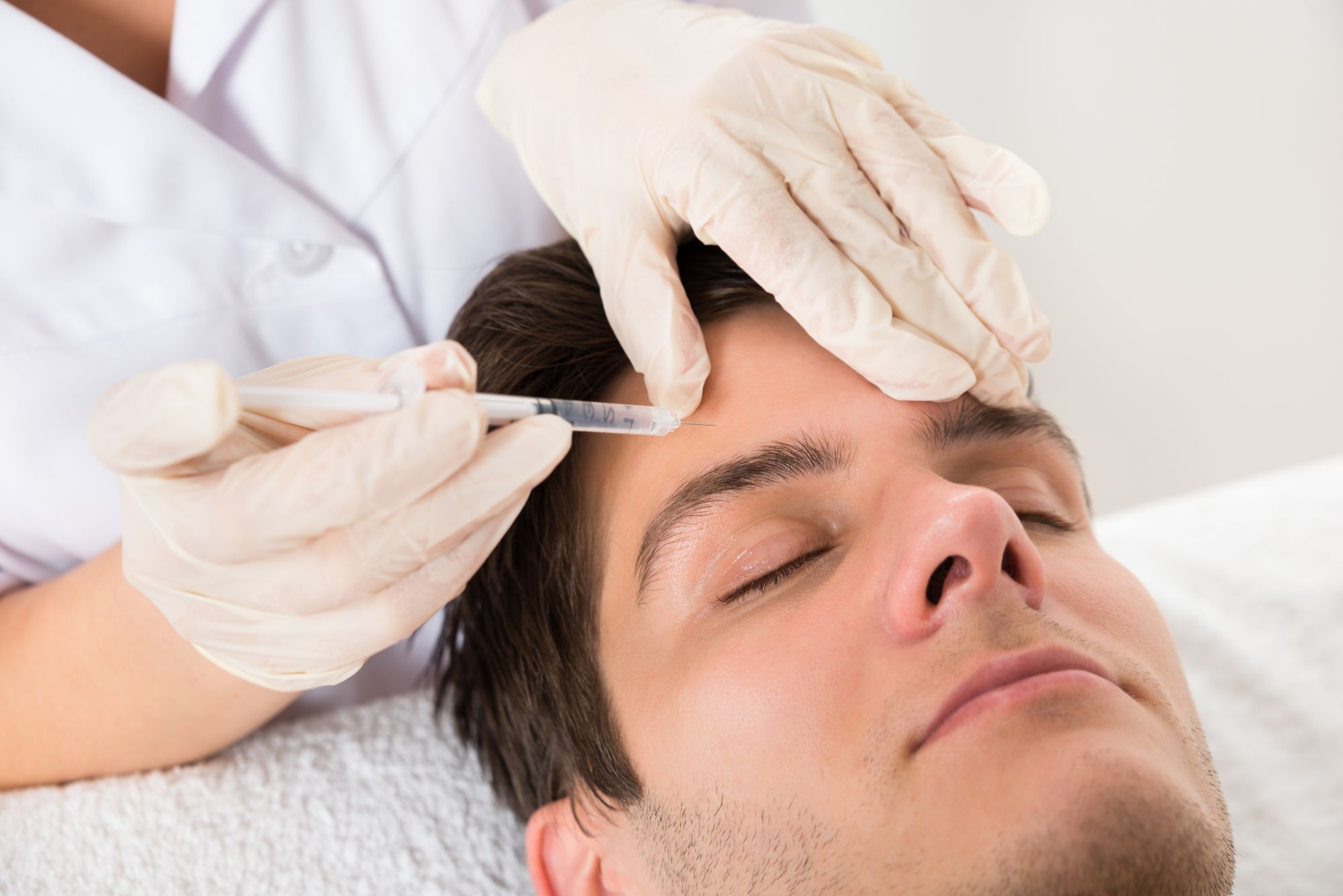 After researching the lying down after Botox myth, a young man decides to get a Botox treatment.